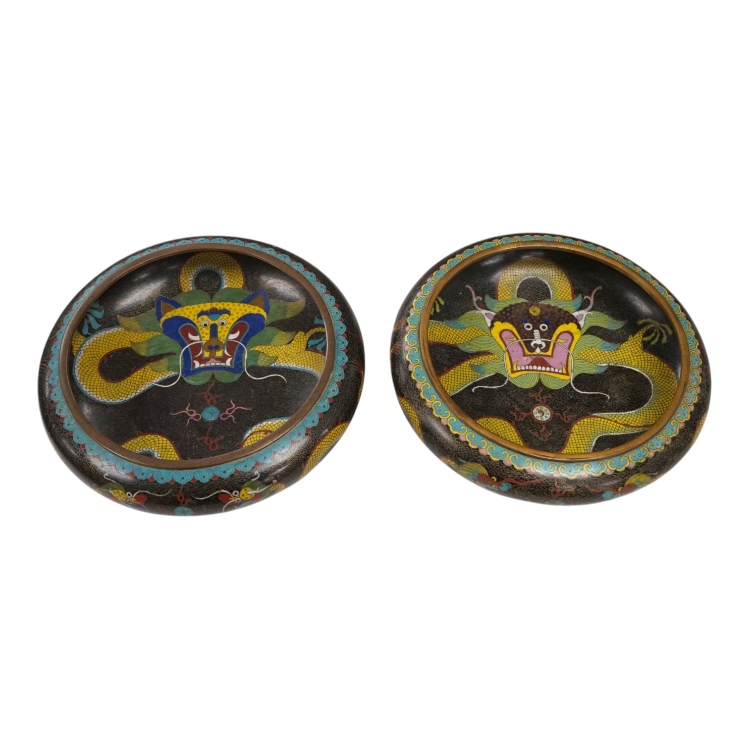 A pair of early 20th century Chinese cloisonné enamel ‘dragon’ bowls, 30cm diameter. Condition - fair to good